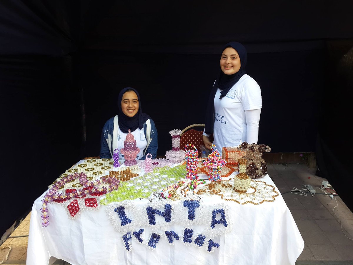 The INTA Pioneer market stall — early student showcase