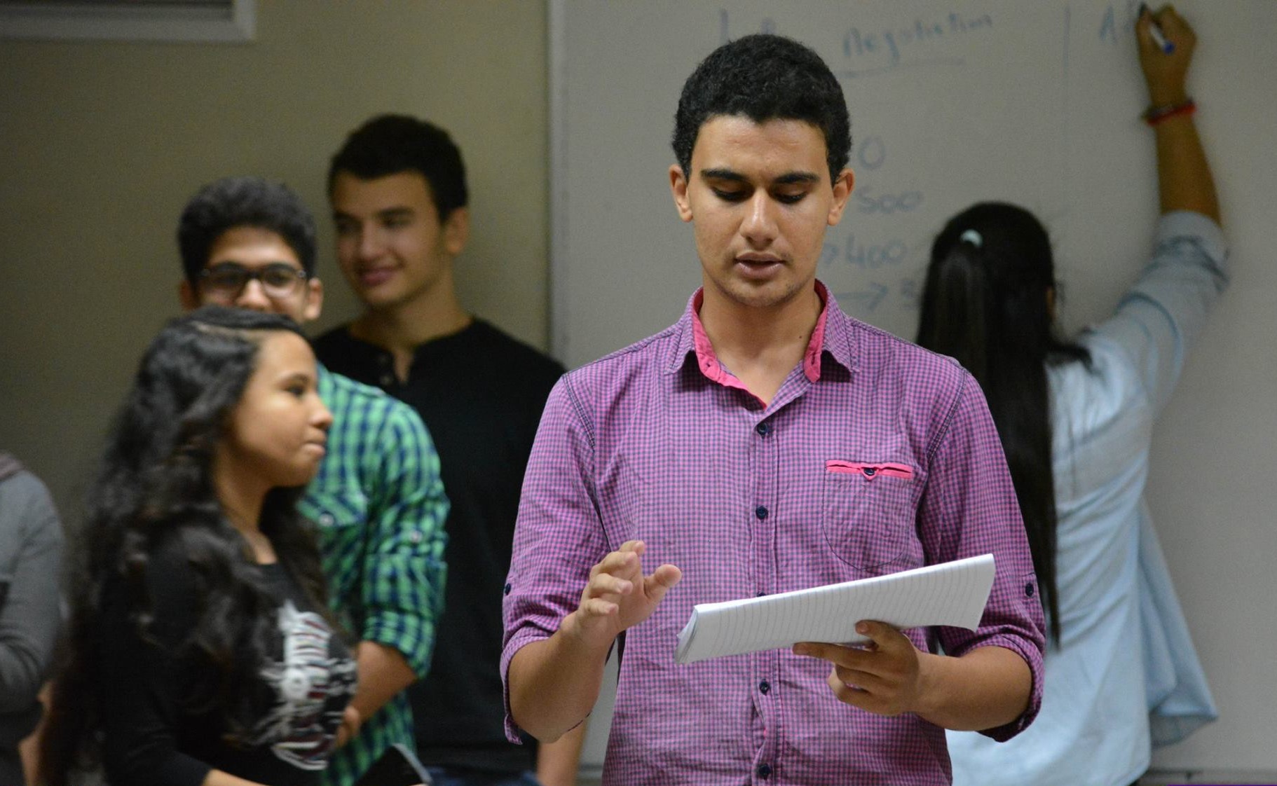 A student presenting during the Money Module